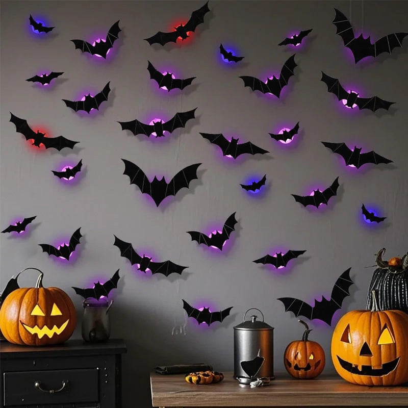 Glowing Halloween bats decorating a wall